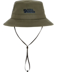 Green bucket hat with a Fjällräven logo on a white background