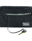 Black crossbody bag with a key attached on a white background, featuring Fjällräven logo.