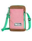 Pink crossbody sling  bag with brown accents and green straps on a white background, featuring Fjällräven logo.