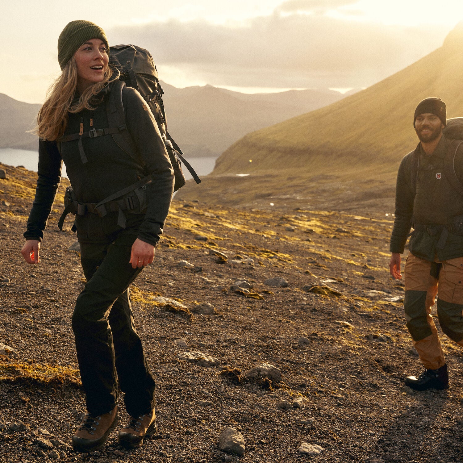 couple trekking on rocky mountain
