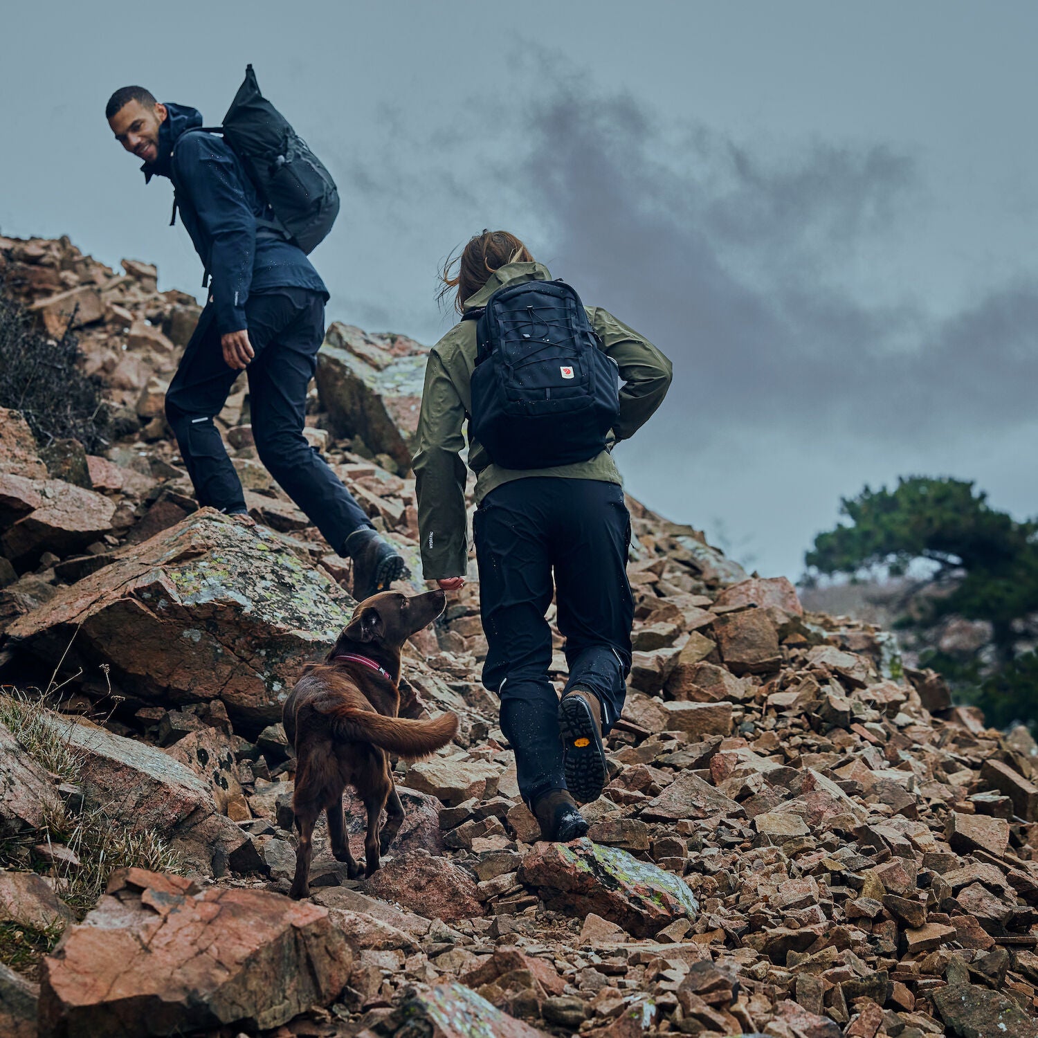 couple hiking up stone pavement