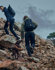 couple hiking up stone pavement