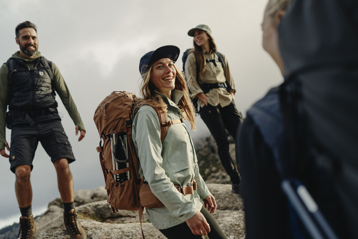 group of friends doing a hiking trip carrying hiking backpacks