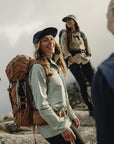 group of friends doing a hiking trip carrying hiking backpacks