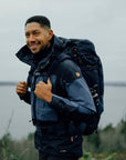 man wearing dark navy-uncle blue jacket