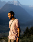 man in chalk rose round neck t-shirt with arctic fox logo hiking