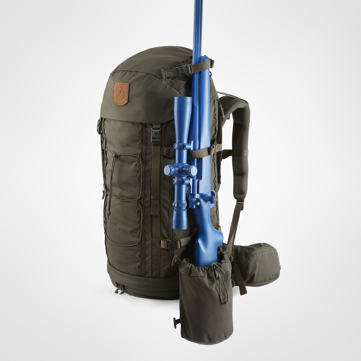 Green backpack with a blue rifle attached on a white background