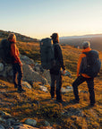 three people enjoying the hike while carrying hiking backpacks