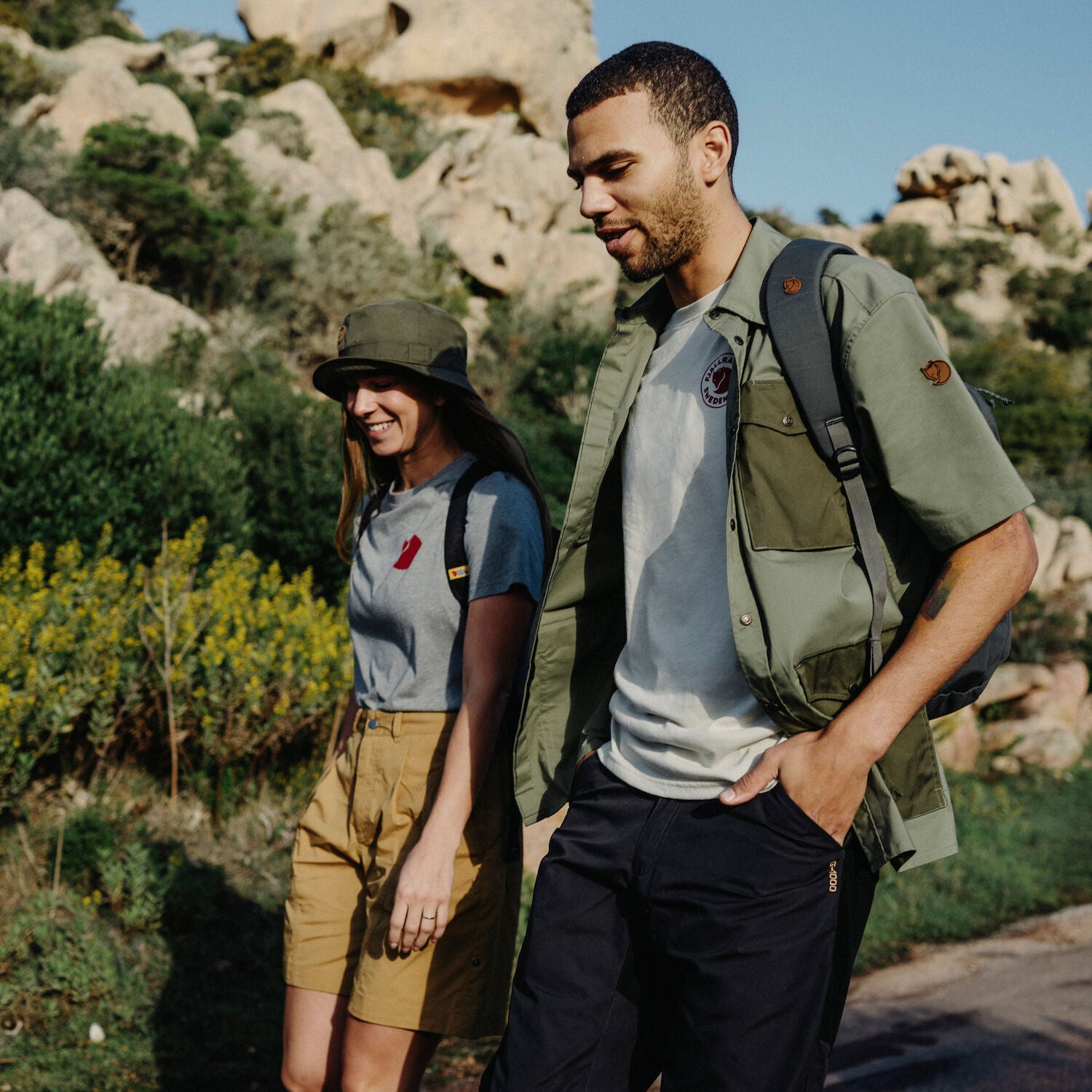 couple wearing summer trekking wear on a trekking trip