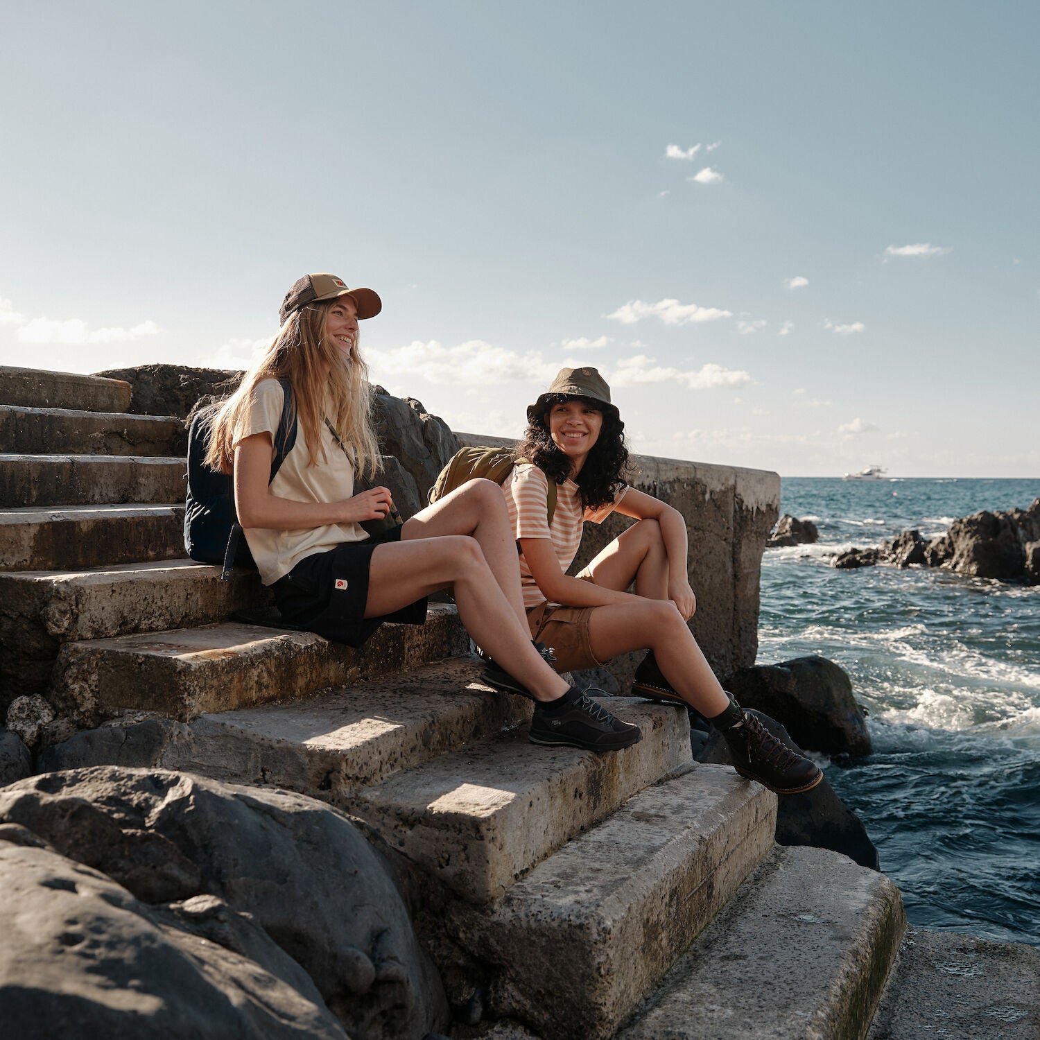 woman hanging out on coastal staircase