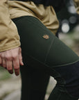 woman wearing deep forest tights with reinforced knees and Fjällräven logo