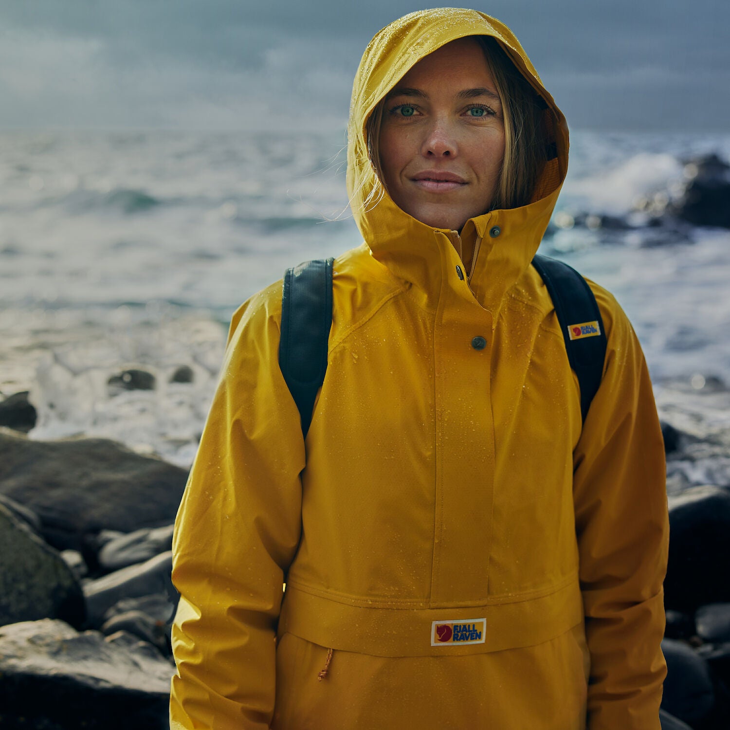 mustard yellow waterproof rain jacket with hood