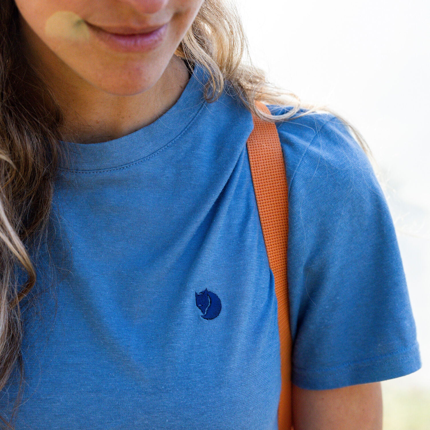 blue round t-shirt with arctic fox logo
